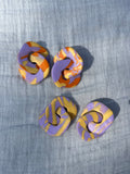 Boucles d'oreilles ronds entrelacés marbrés